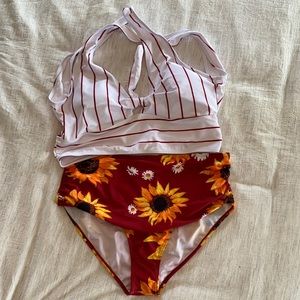 Bathing suits. Never worn. Still with sanitary liner